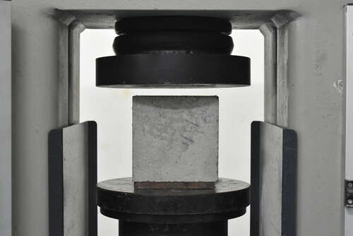 Concrete Block Kept On Strength Testing Machine | UltraTech Cement