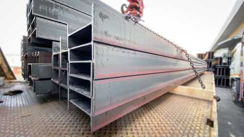 Products of metal structure fabrication factory, I-beam welded H-beam steel, Selective Focus, raw materials used in building construction. steel floor beams in piles